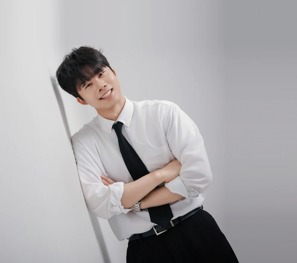 Founder Hajun Kim smiling at the camera